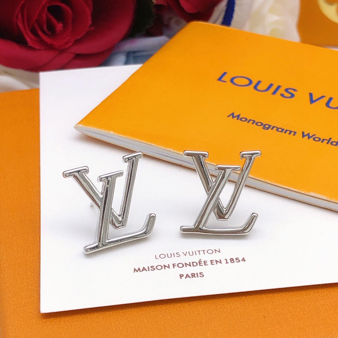 Martin Graham stud earrings in polished metal-tone – main product view