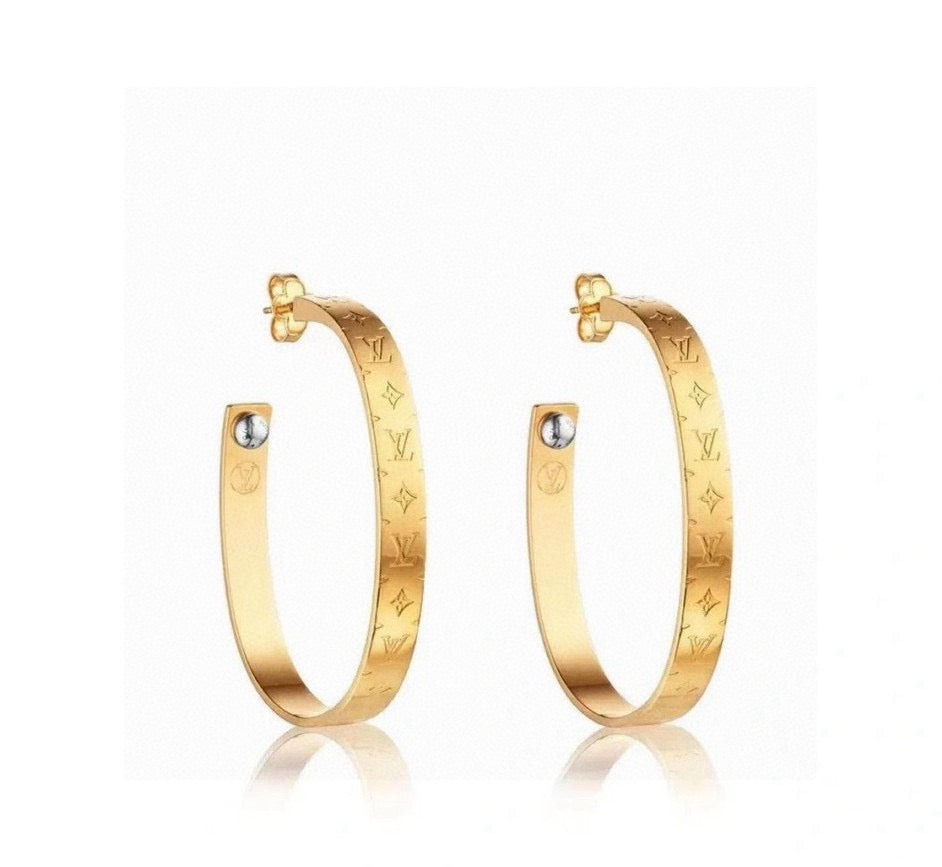 Martin Graham stud earrings in polished metal-tone – main product view