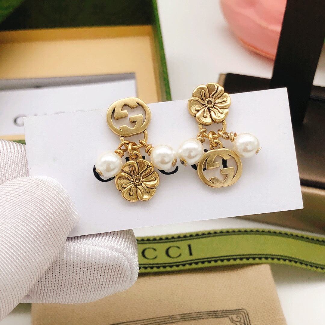 Martin Graham stud earrings in polished metal-tone – main product view