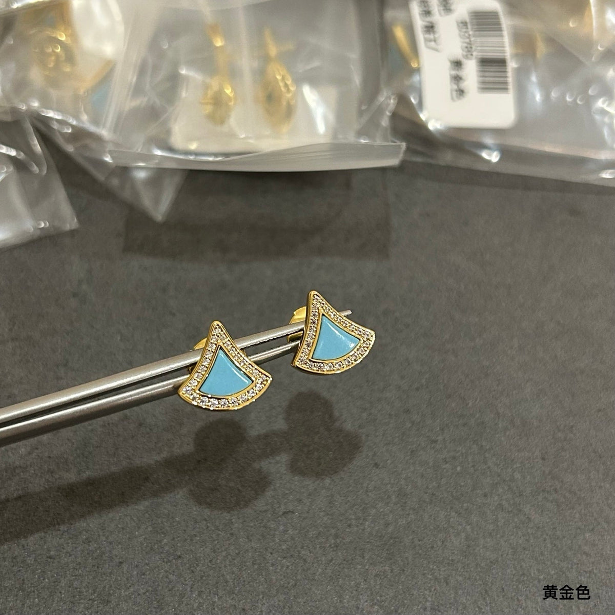 Martin Graham stud earrings in polished metal-tone – main product view
