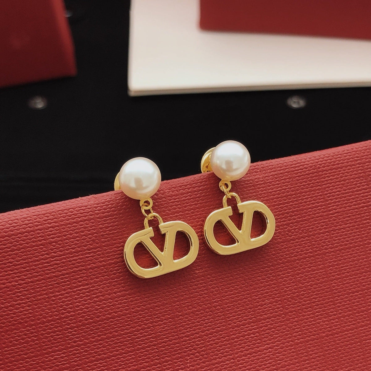 Martin Graham stud earrings in polished metal-tone – main product view