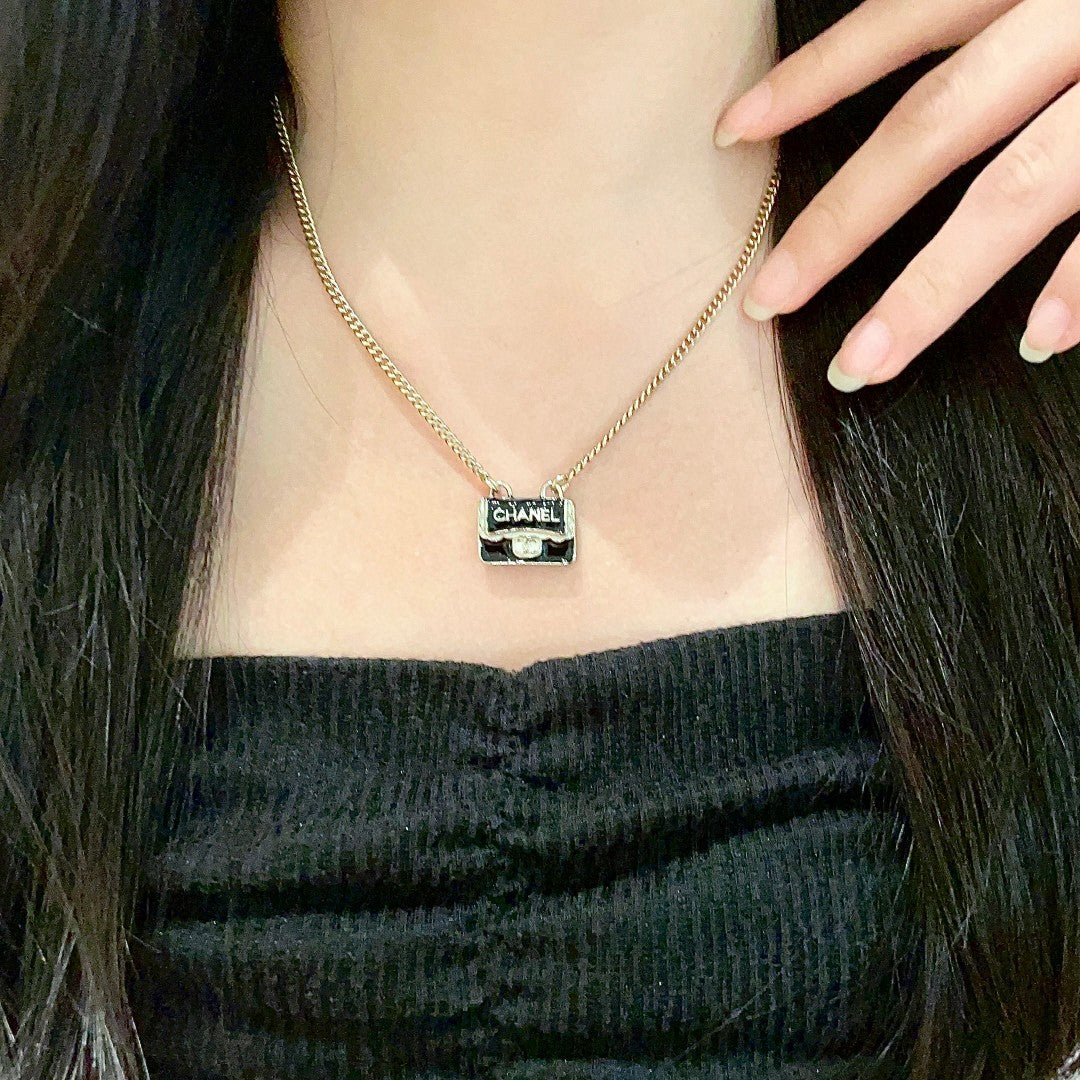 Martin Graham pendant necklace in polished metal-tone – main product view