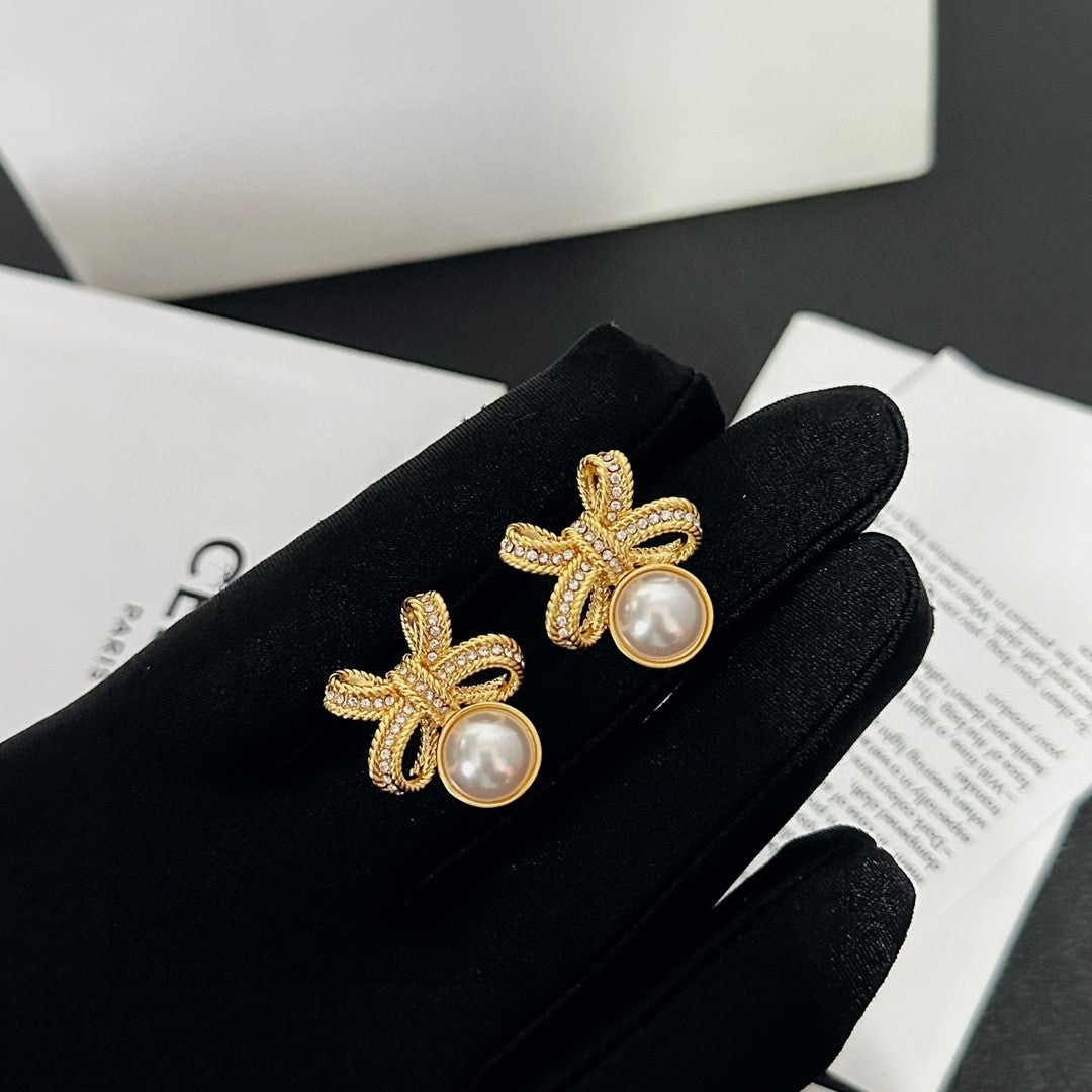 Martin Graham stud earrings in polished metal-tone – main product view