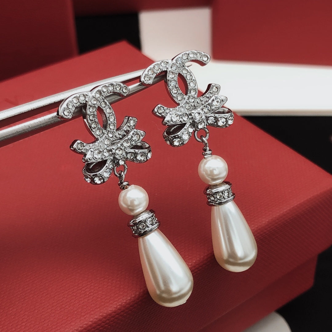 Martin Graham stud earrings in polished metal-tone – main product view