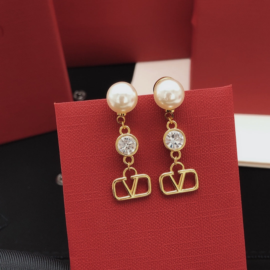 Martin Graham stud earrings in polished metal-tone – main product view