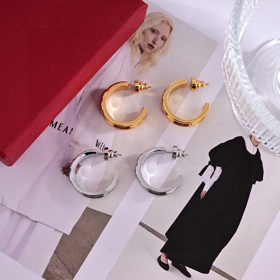 Martin Graham stud earrings in polished metal-tone – main product view
