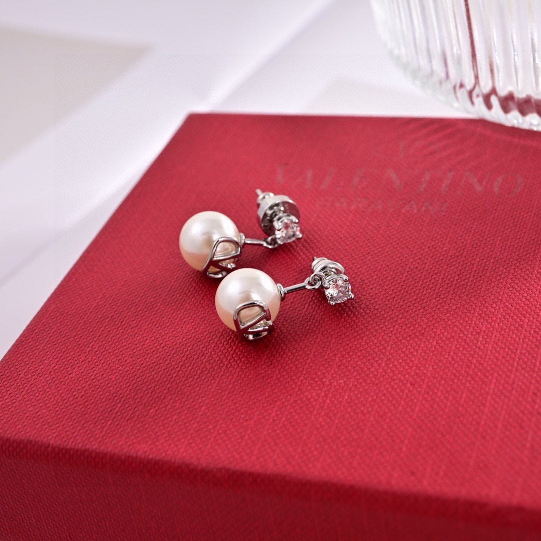 Martin Graham stud earrings in polished metal-tone – main product view