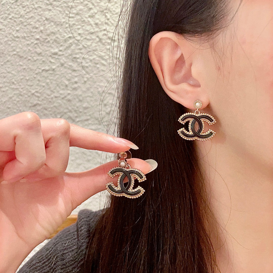 Martin Graham earrings in polished metal-tone – main product view