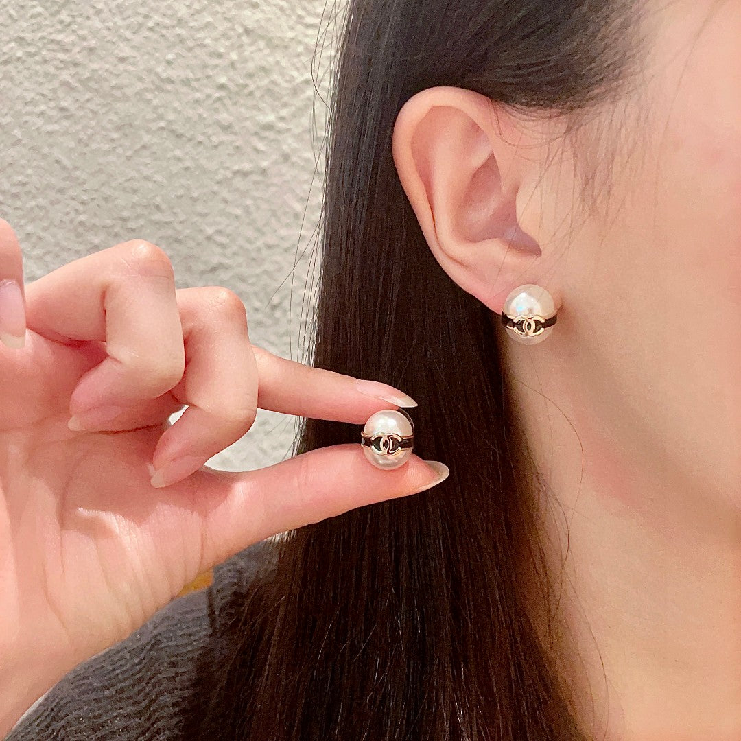 Martin Graham stud earrings in polished metal-tone – main product view