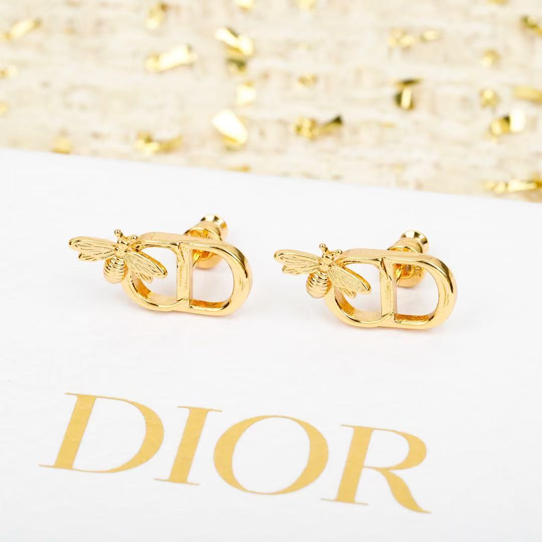Martin Graham stud earrings in polished metal-tone – main product view