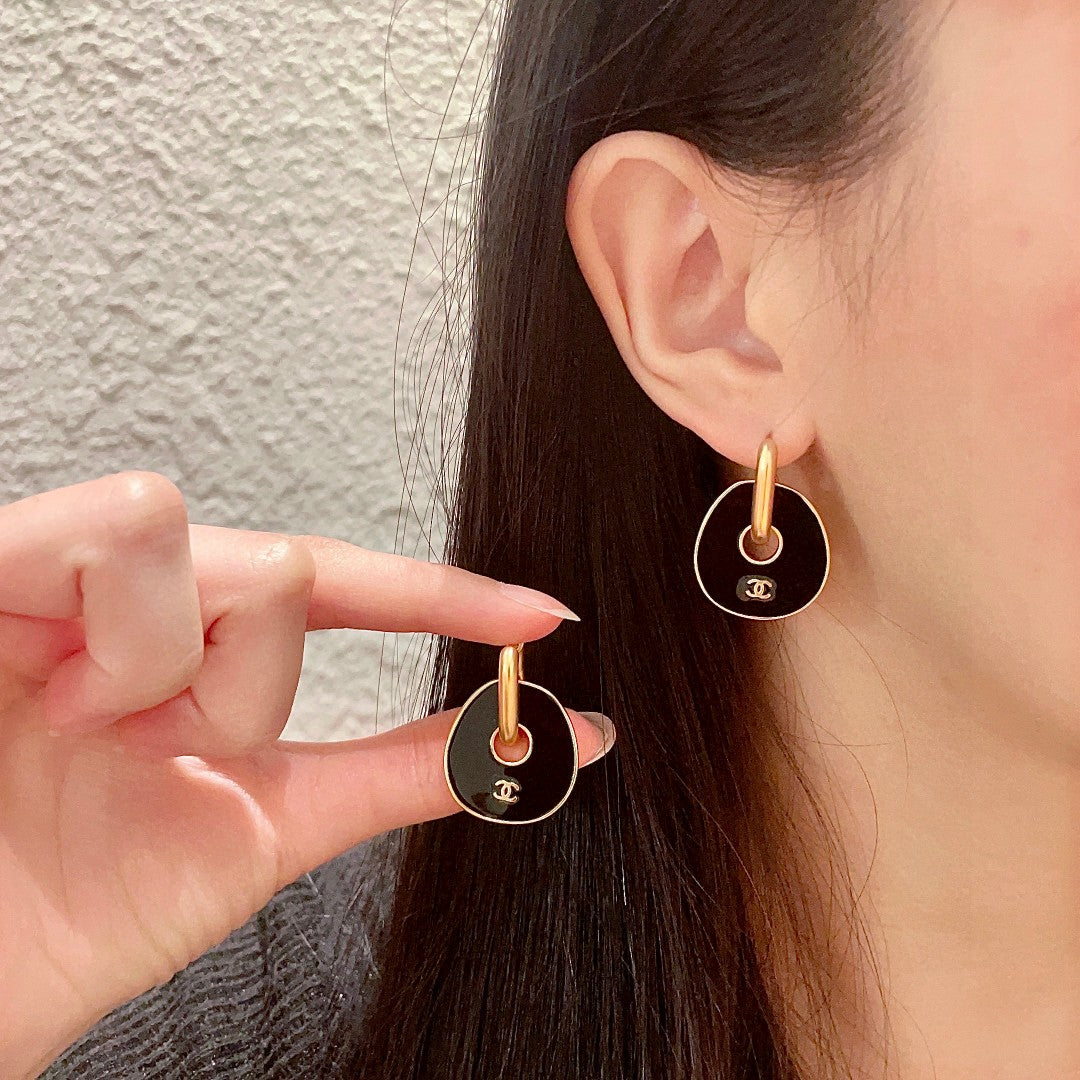Martin Graham earrings in polished metal-tone – main product view