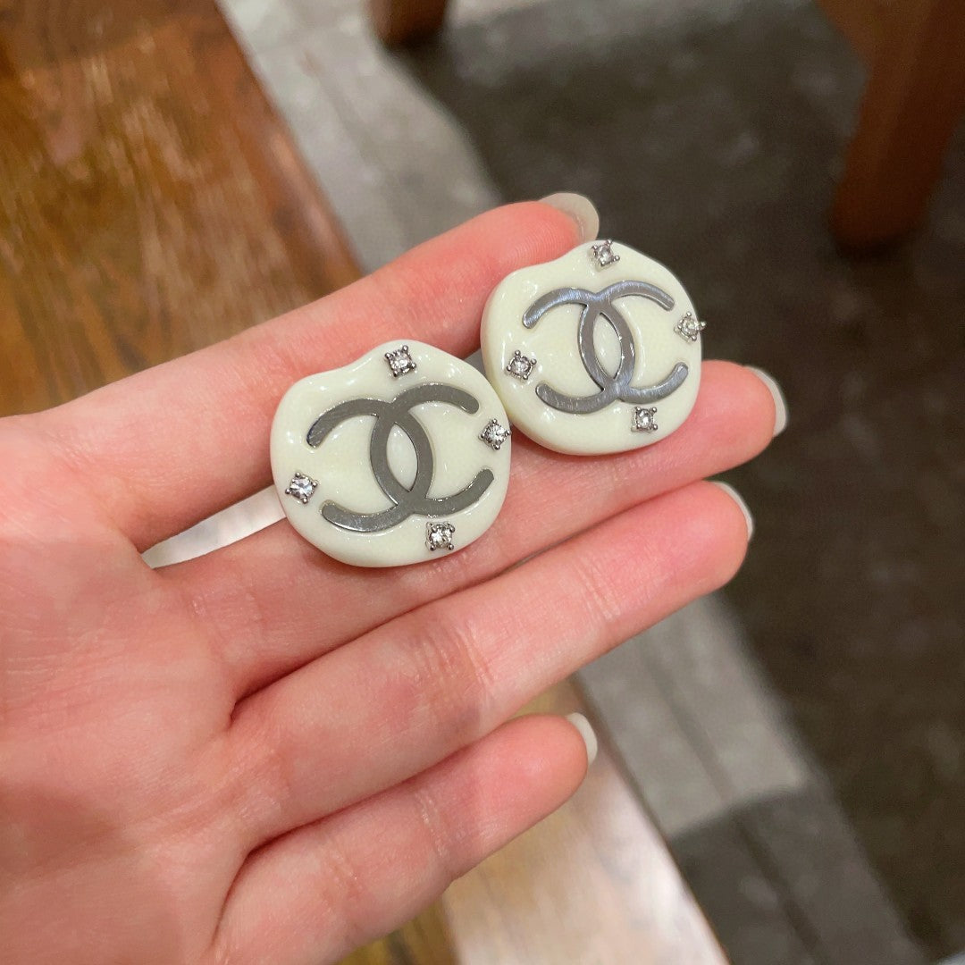 Martin Graham stud earrings in polished metal-tone – main product view