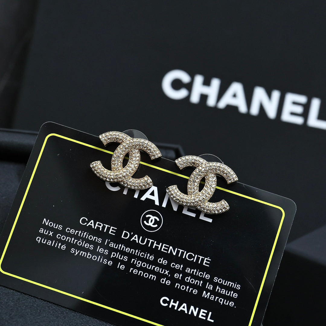 Martin Graham stud earrings in polished metal-tone – main product view