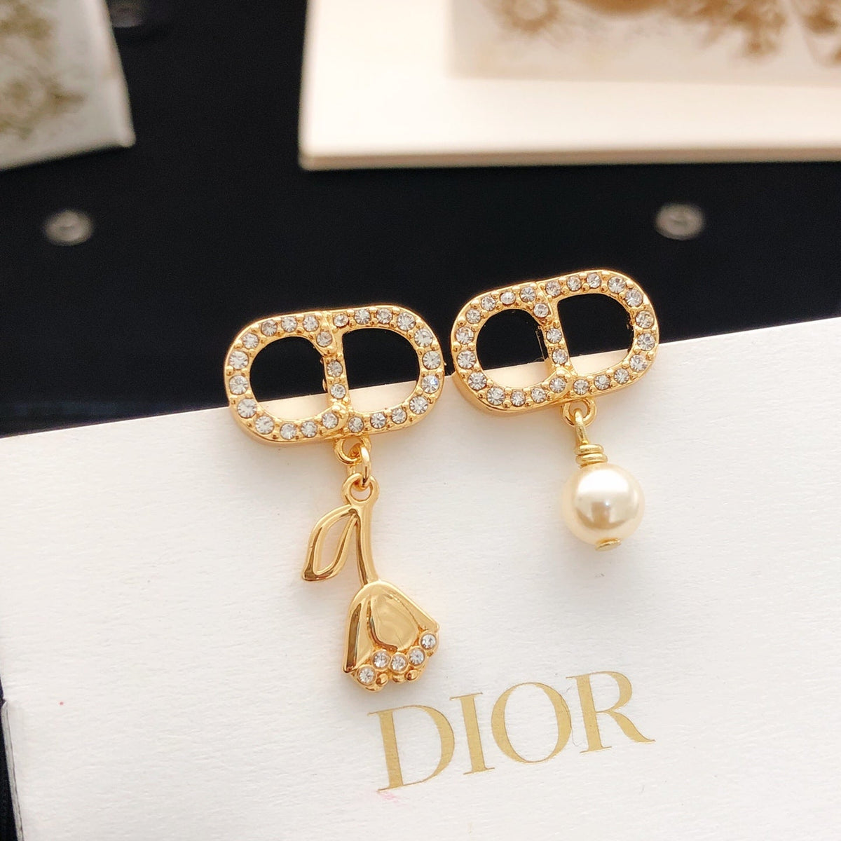 Martin Graham stud earrings in polished metal-tone – main product view