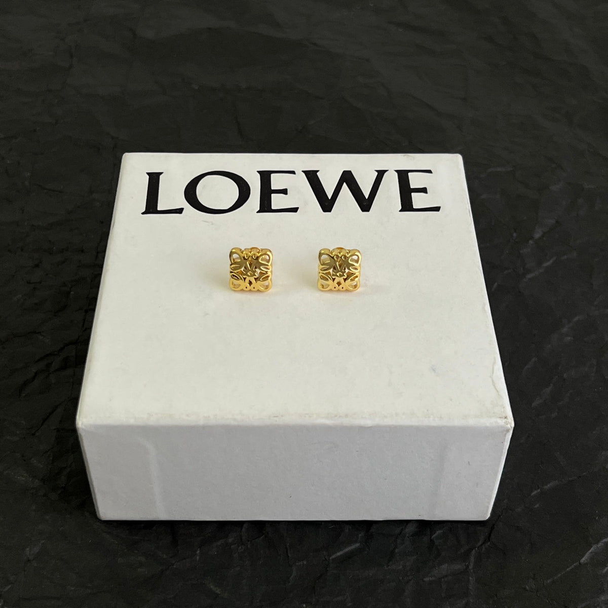 Martin Graham stud earrings in polished metal-tone – main product view