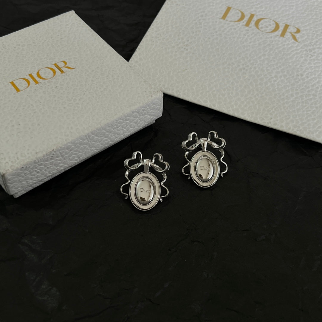 Martin Graham stud earrings in polished metal-tone – main product view