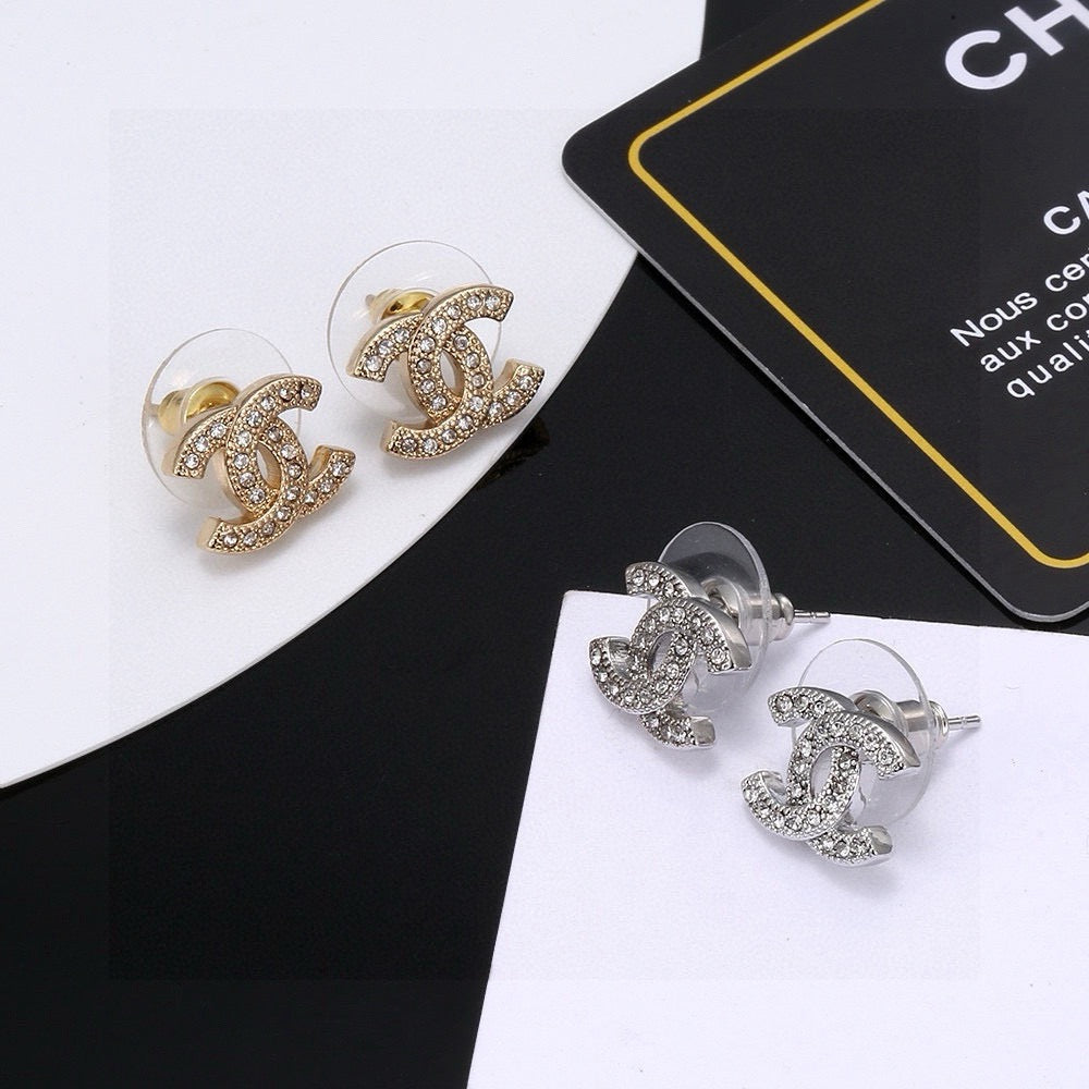 Martin Graham stud earrings in polished metal-tone – main product view