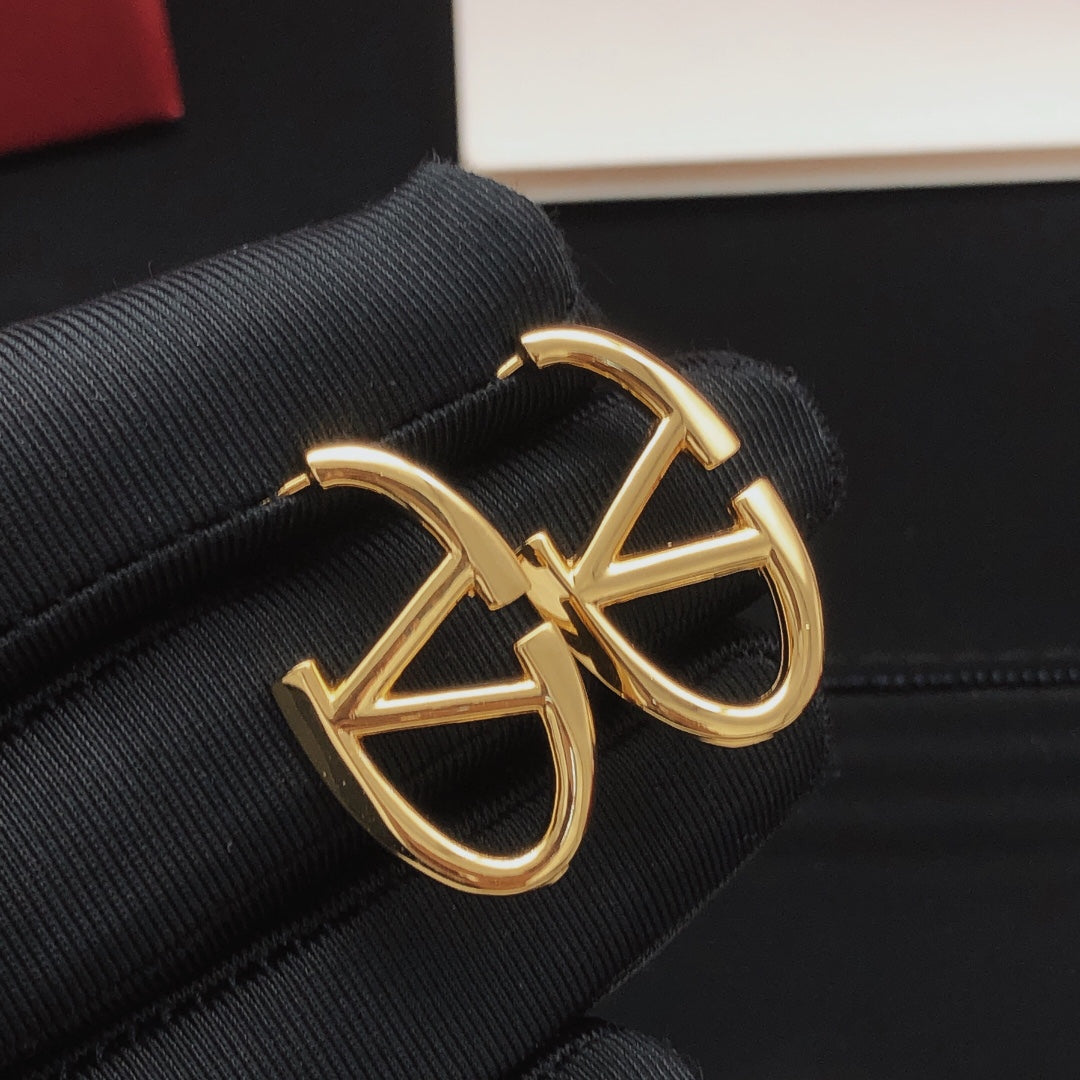 Martin Graham stud earrings in polished metal-tone – main product view