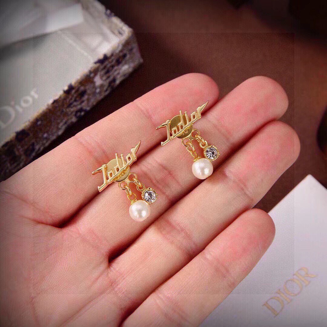 Martin Graham stud earrings in polished metal-tone – main product view