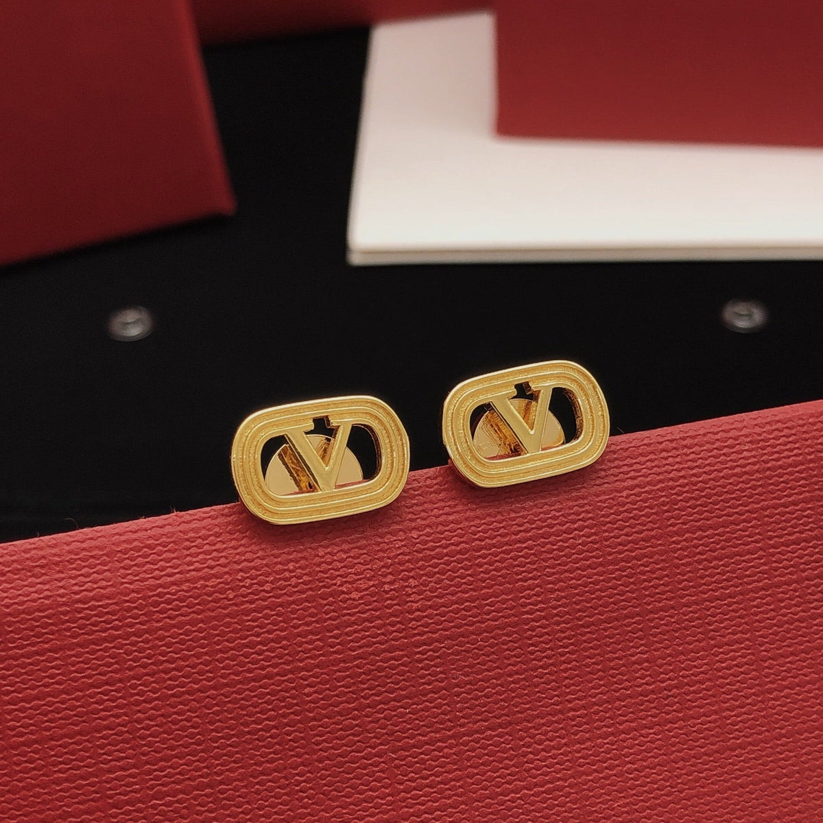 Martin Graham stud earrings in polished metal-tone – main product view
