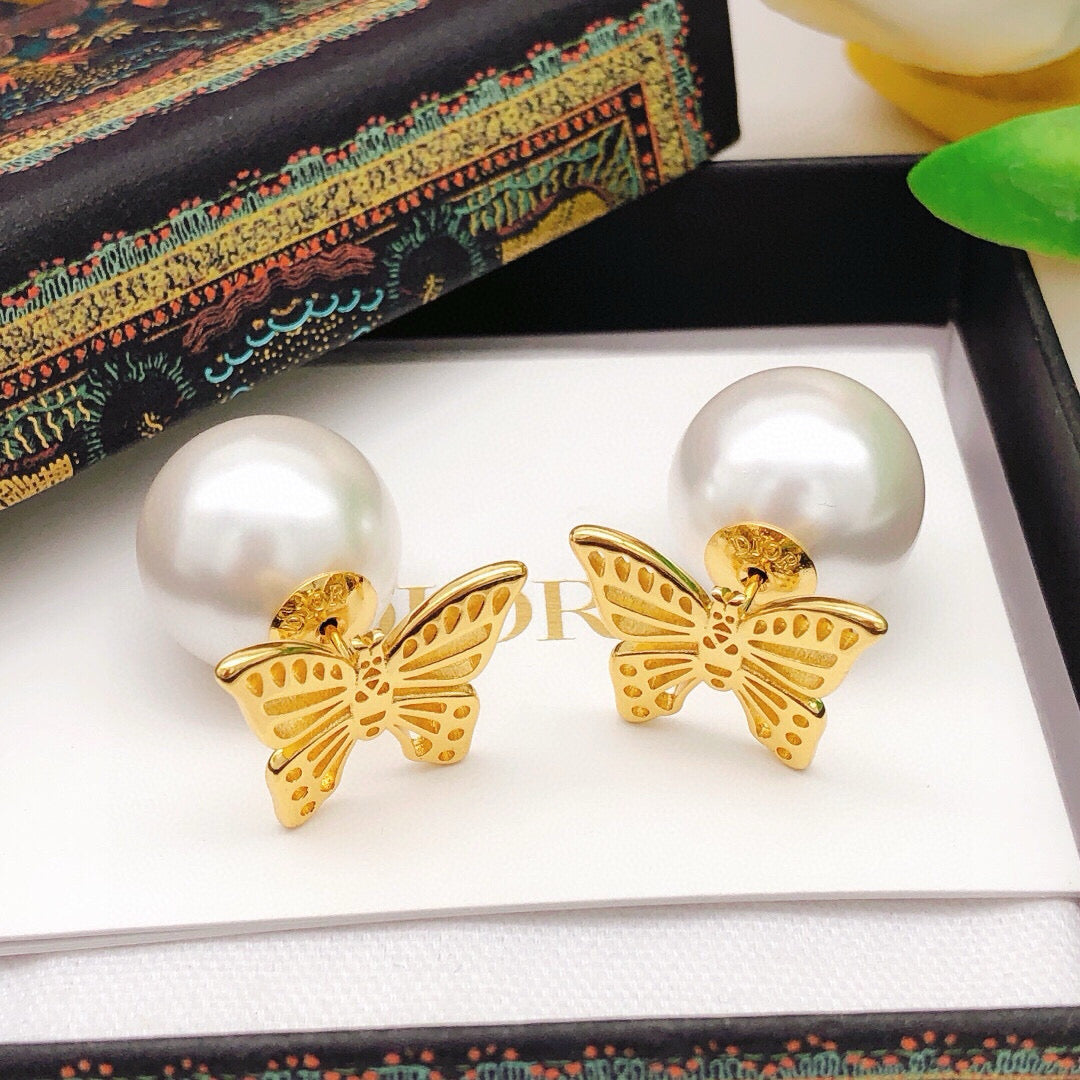 Martin Graham stud earrings in polished metal-tone – main product view
