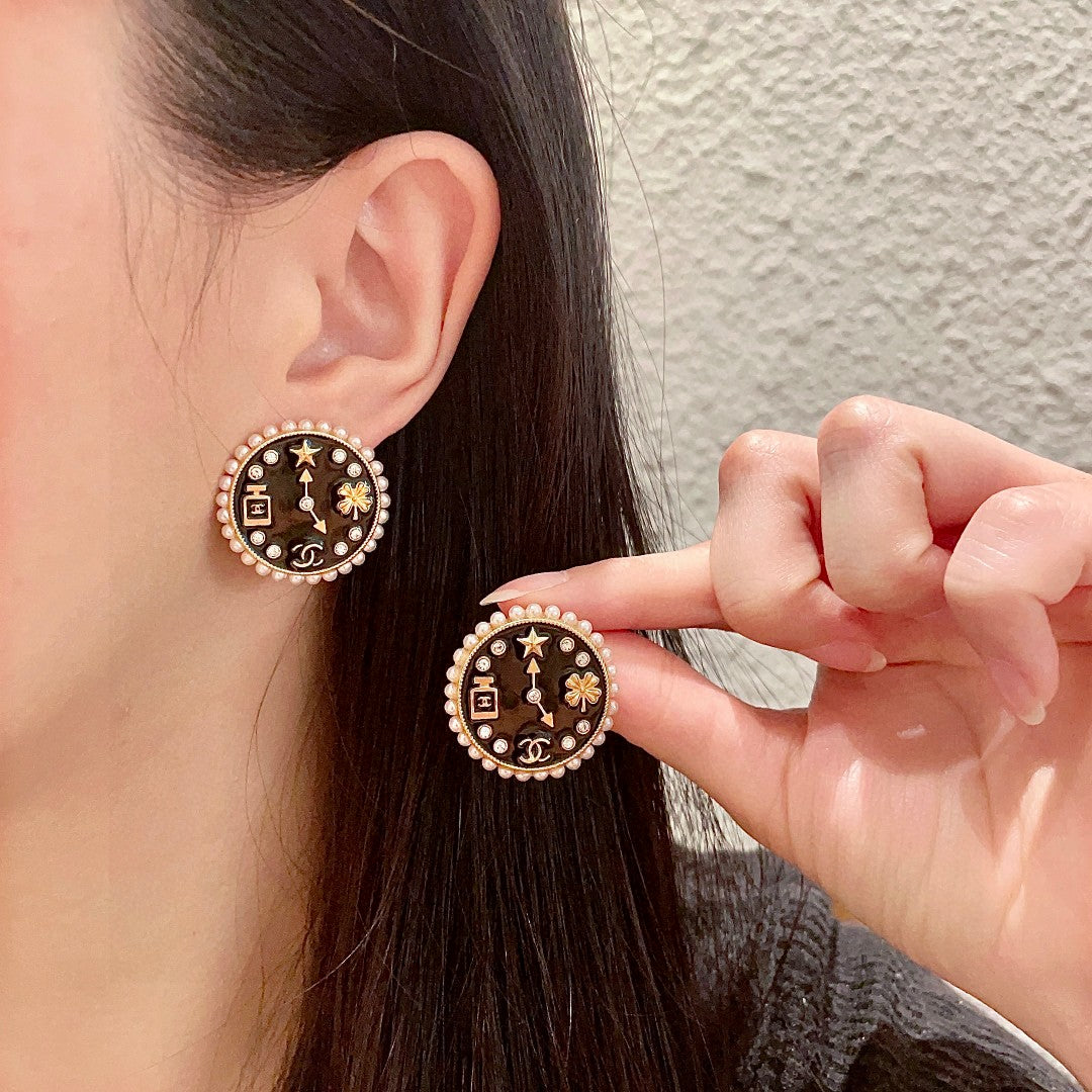 Martin Graham stud earrings in polished metal-tone – main product view