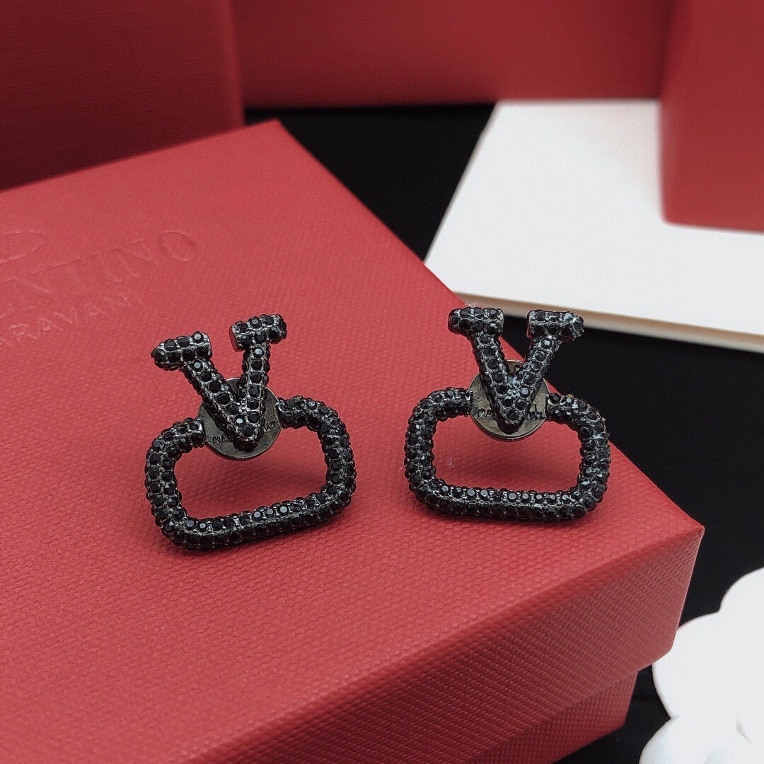 Martin Graham stud earrings in polished metal-tone – main product view