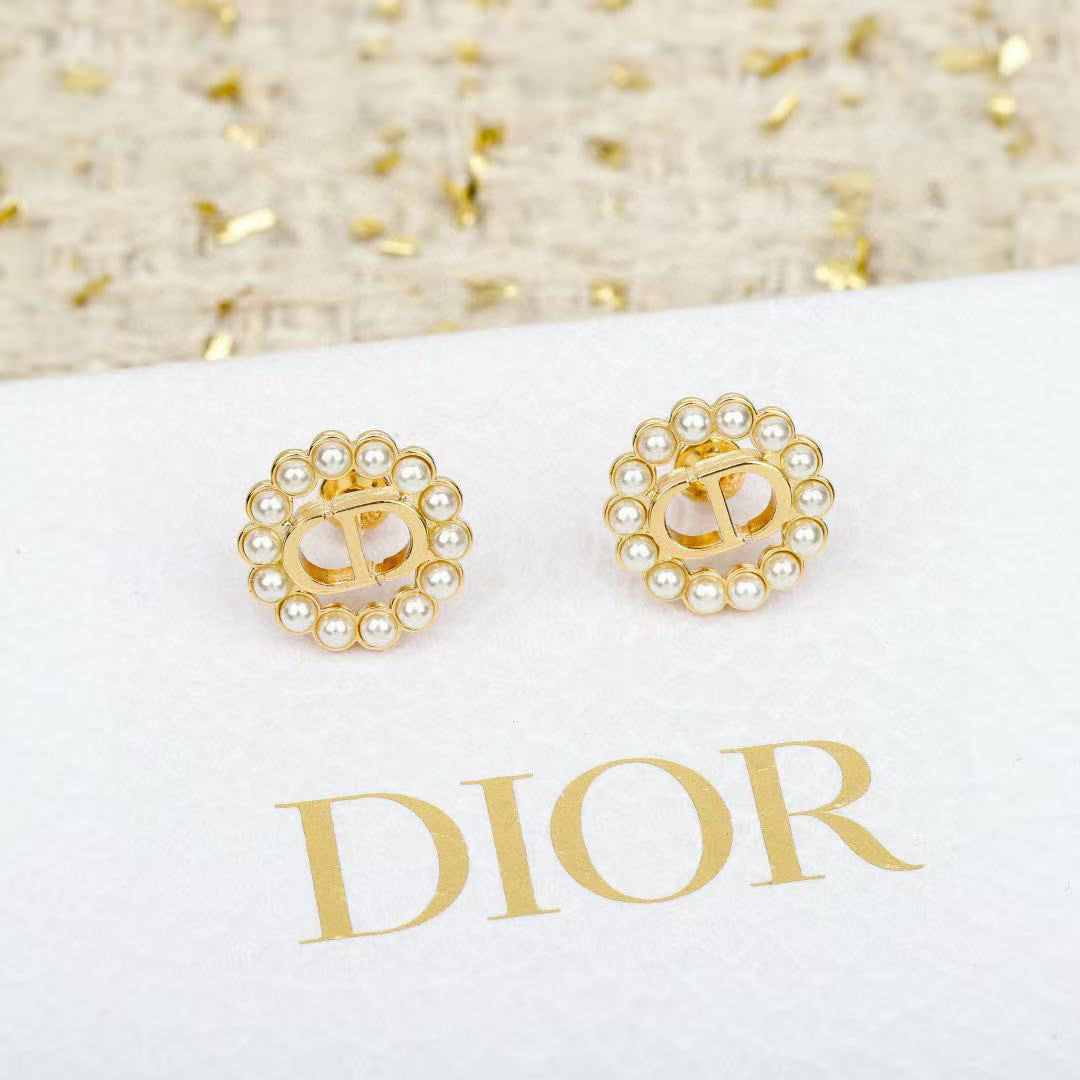 Martin Graham stud earrings in polished metal-tone – main product view