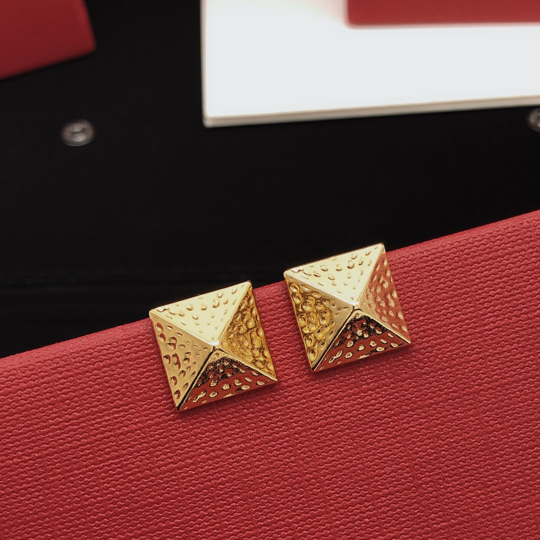 Martin Graham stud earrings in polished metal-tone – main product view
