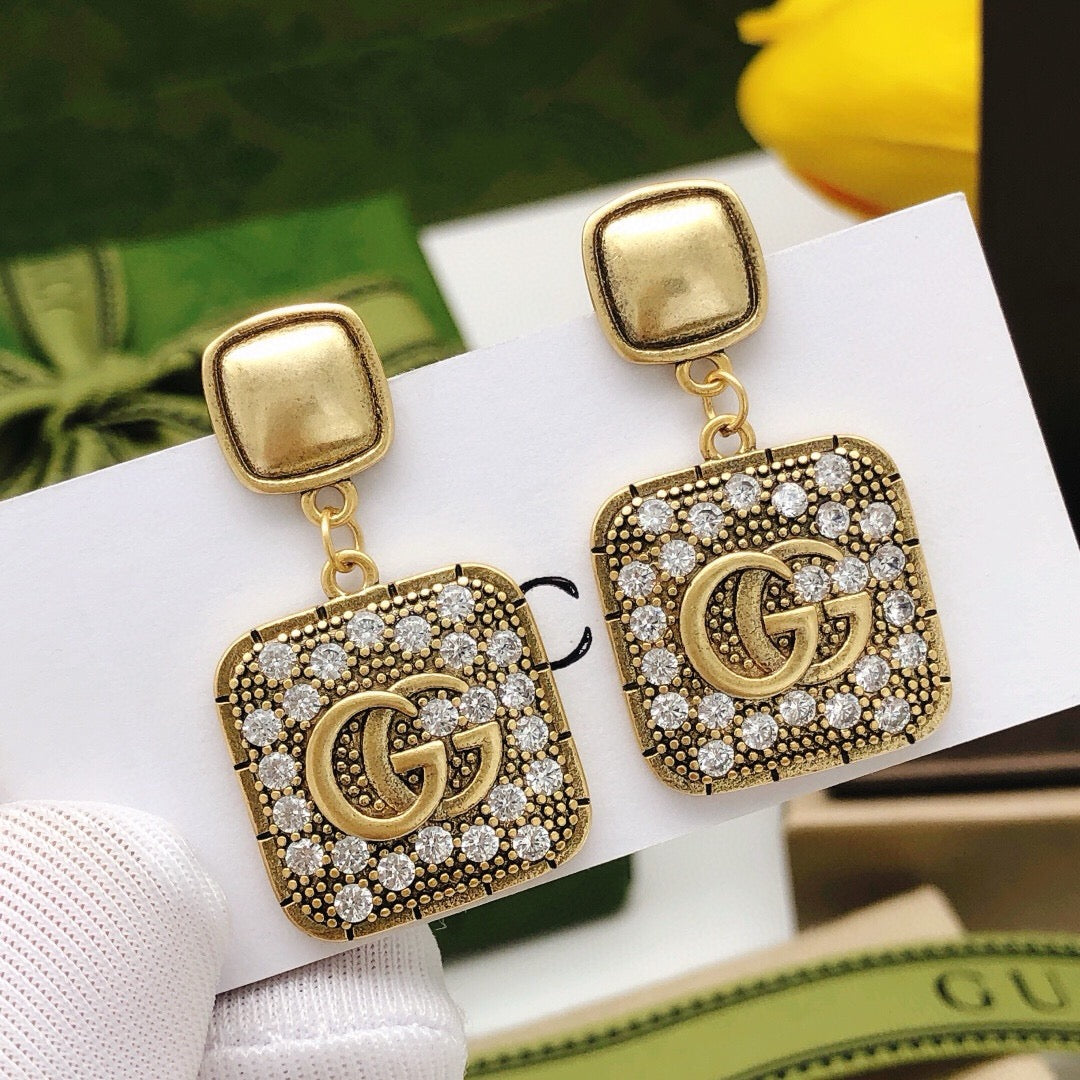 Martin Graham stud earrings in polished metal-tone – main product view
