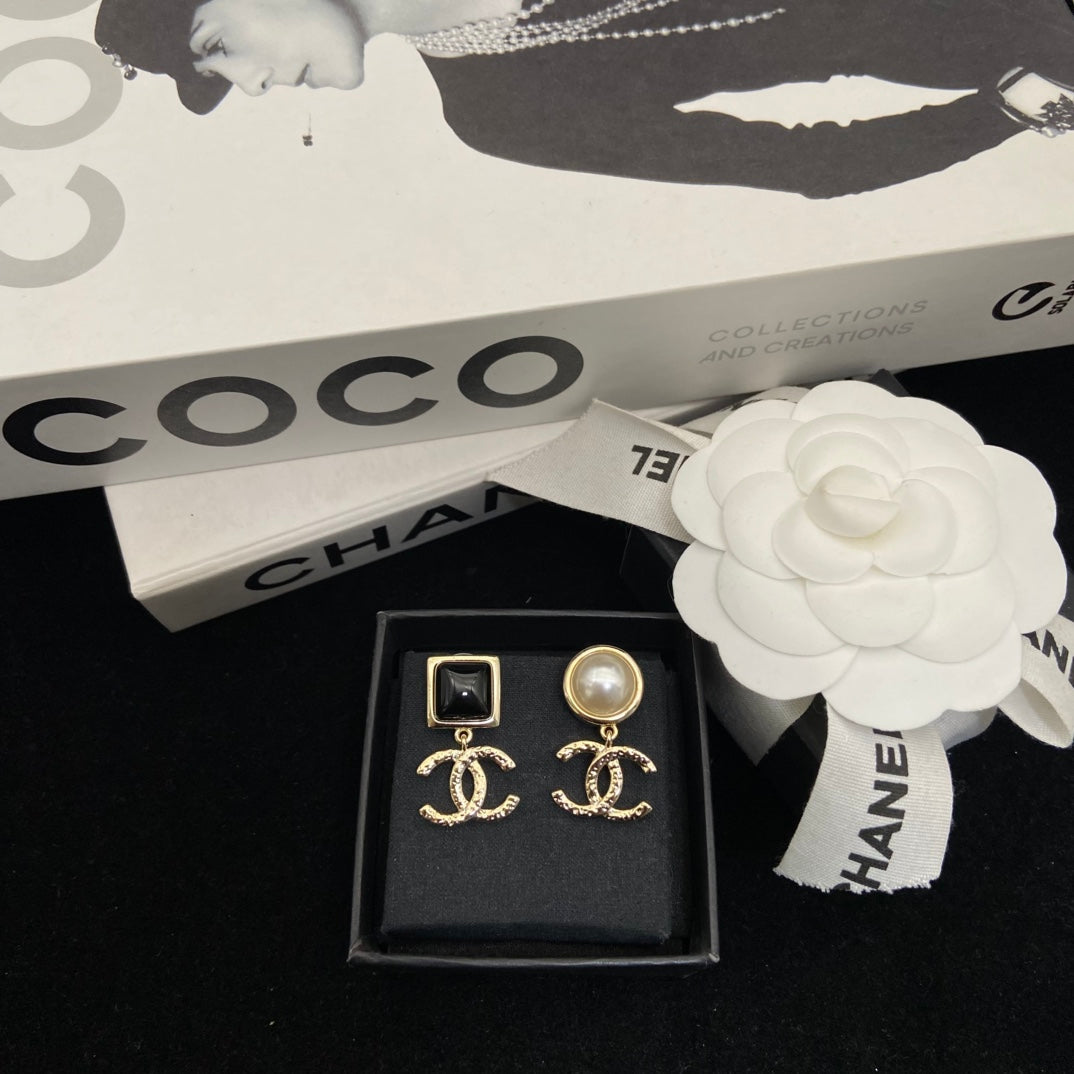 Martin Graham stud earrings in polished metal-tone – main product view