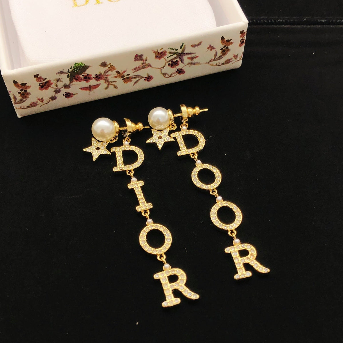Martin Graham stud earrings in polished metal-tone – main product view