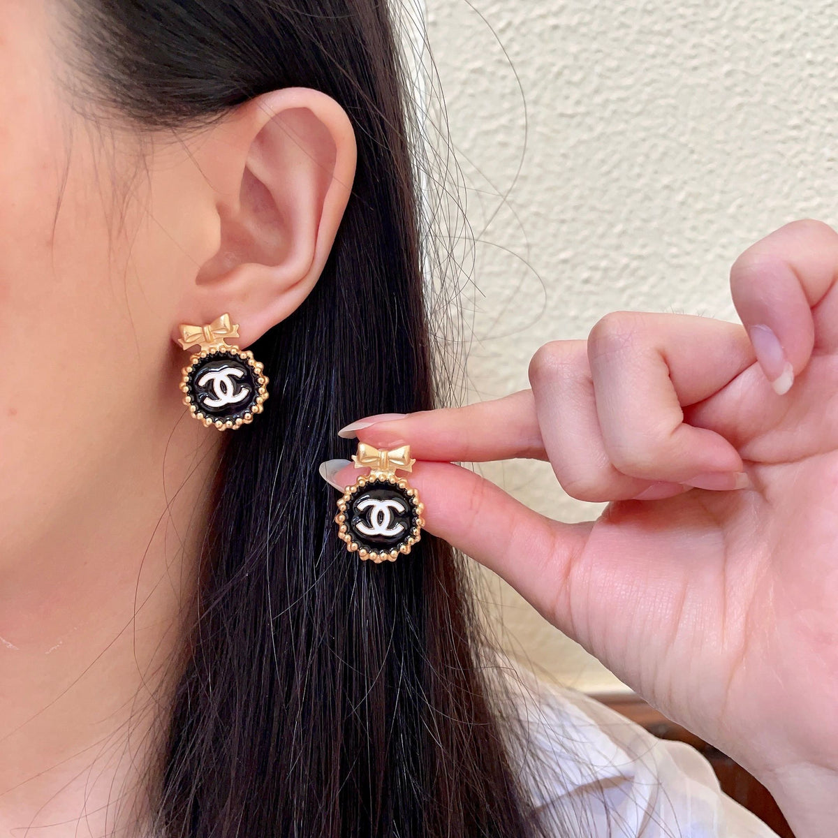 Martin Graham stud earrings in polished metal-tone – main product view
