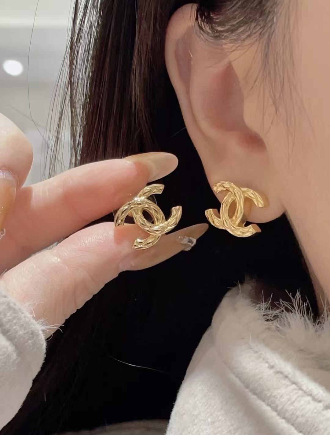 Martin Graham stud earrings in polished metal-tone – main product view
