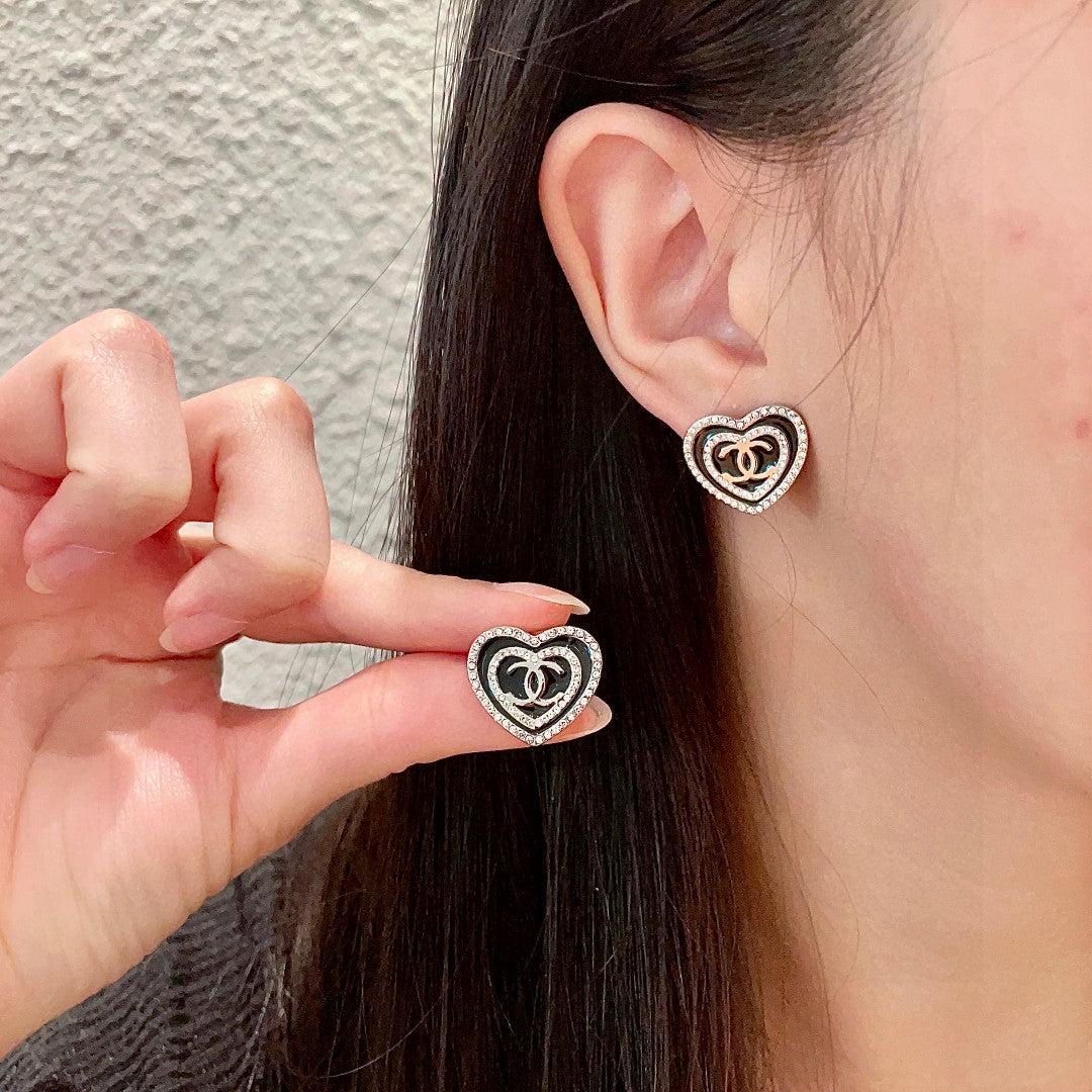 Martin Graham stud earrings in polished metal-tone – main product view