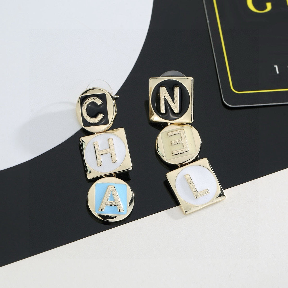 Martin Graham stud earrings in polished metal-tone – main product view