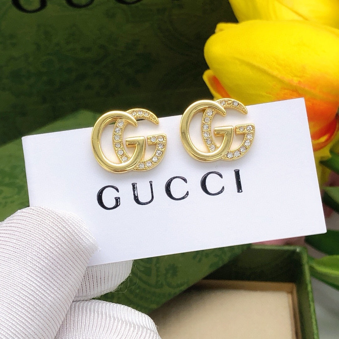 Martin Graham stud earrings in polished metal-tone – main product view