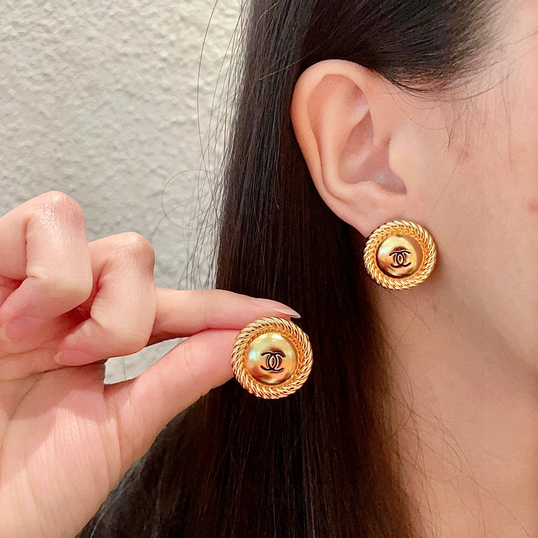 Martin Graham stud earrings in polished metal-tone – main product view