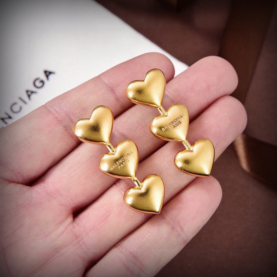 Martin Graham stud earrings in polished metal-tone – main product view