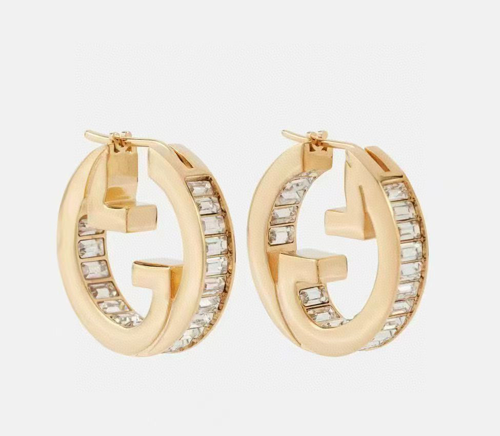 Martin Graham stud earrings in polished metal-tone – main product view