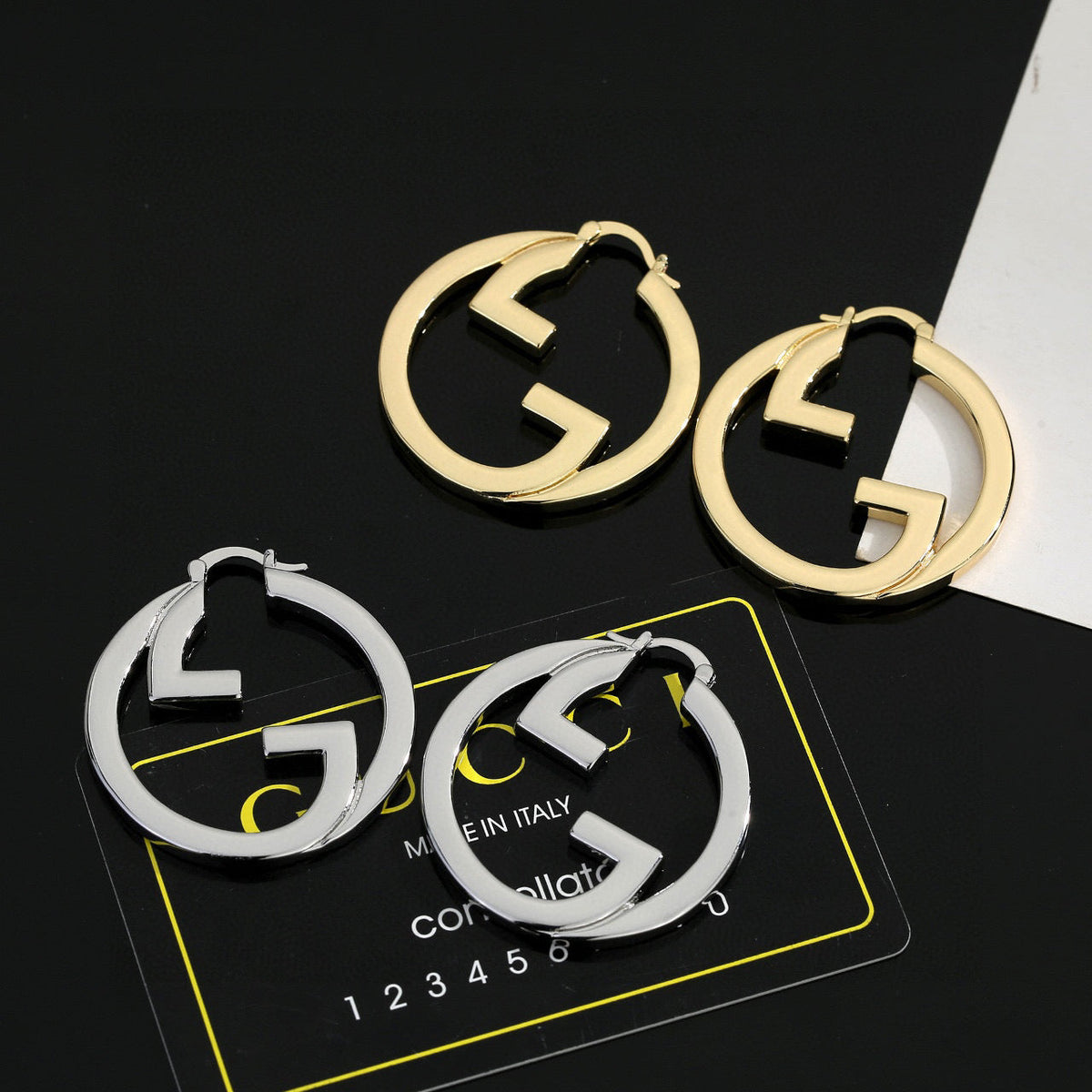 Martin Graham stud earrings in polished metal-tone – main product view