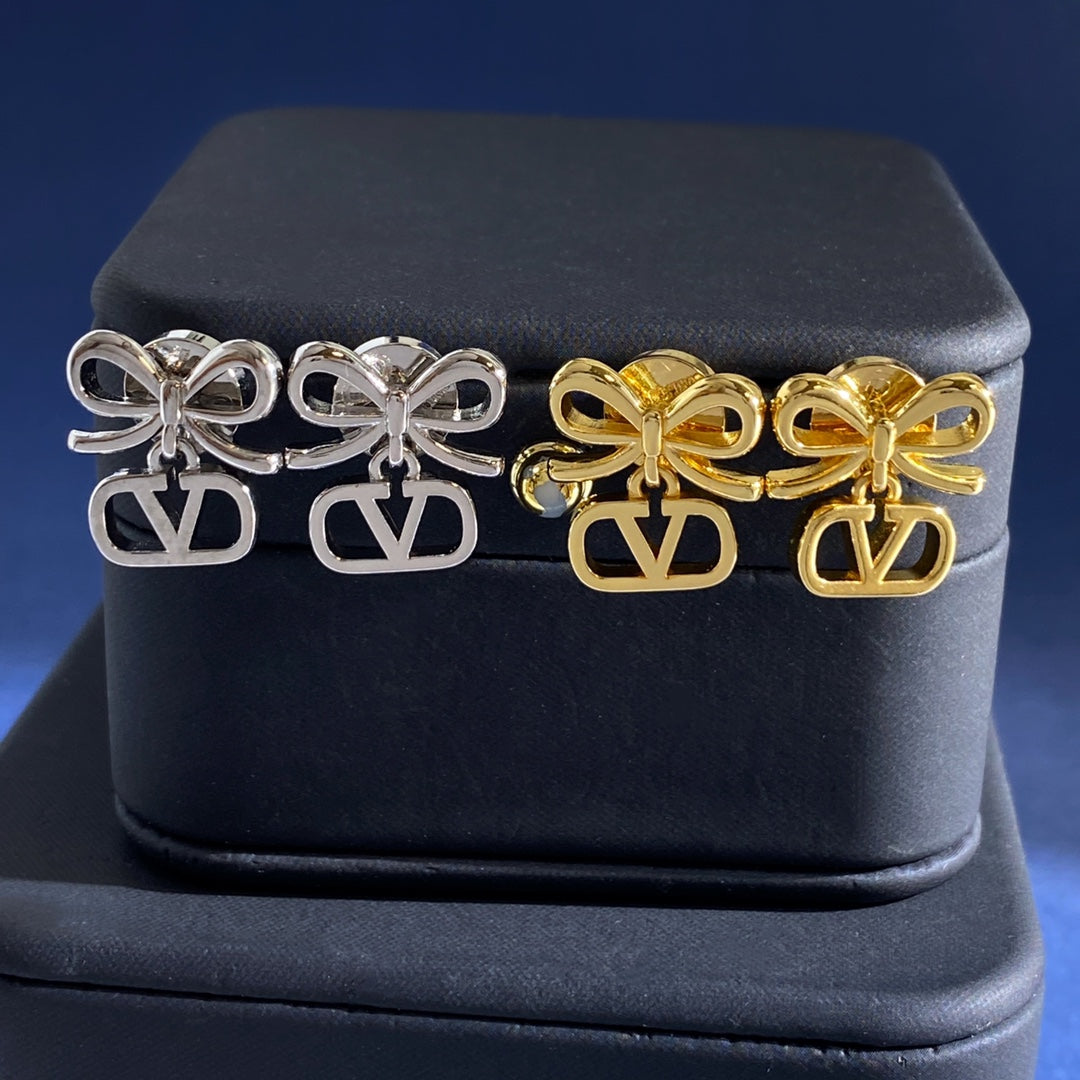 Martin Graham stud earrings in polished metal-tone – main product view