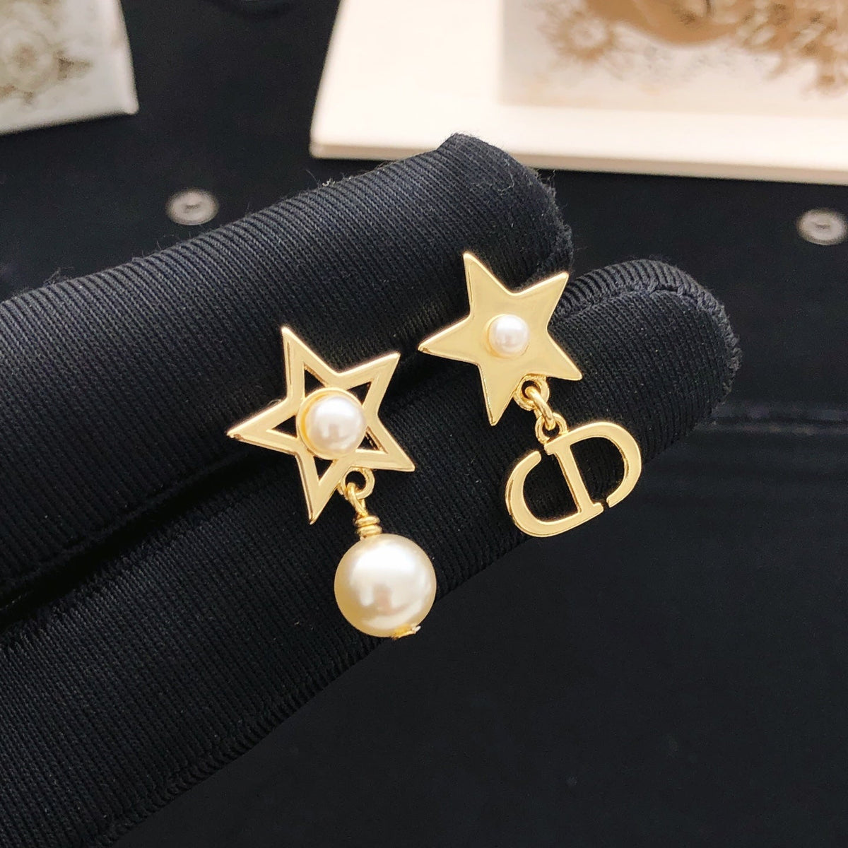 Martin Graham stud earrings in polished metal-tone – main product view