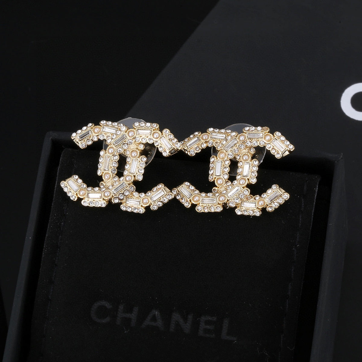 Martin Graham stud earrings in polished metal-tone – main product view