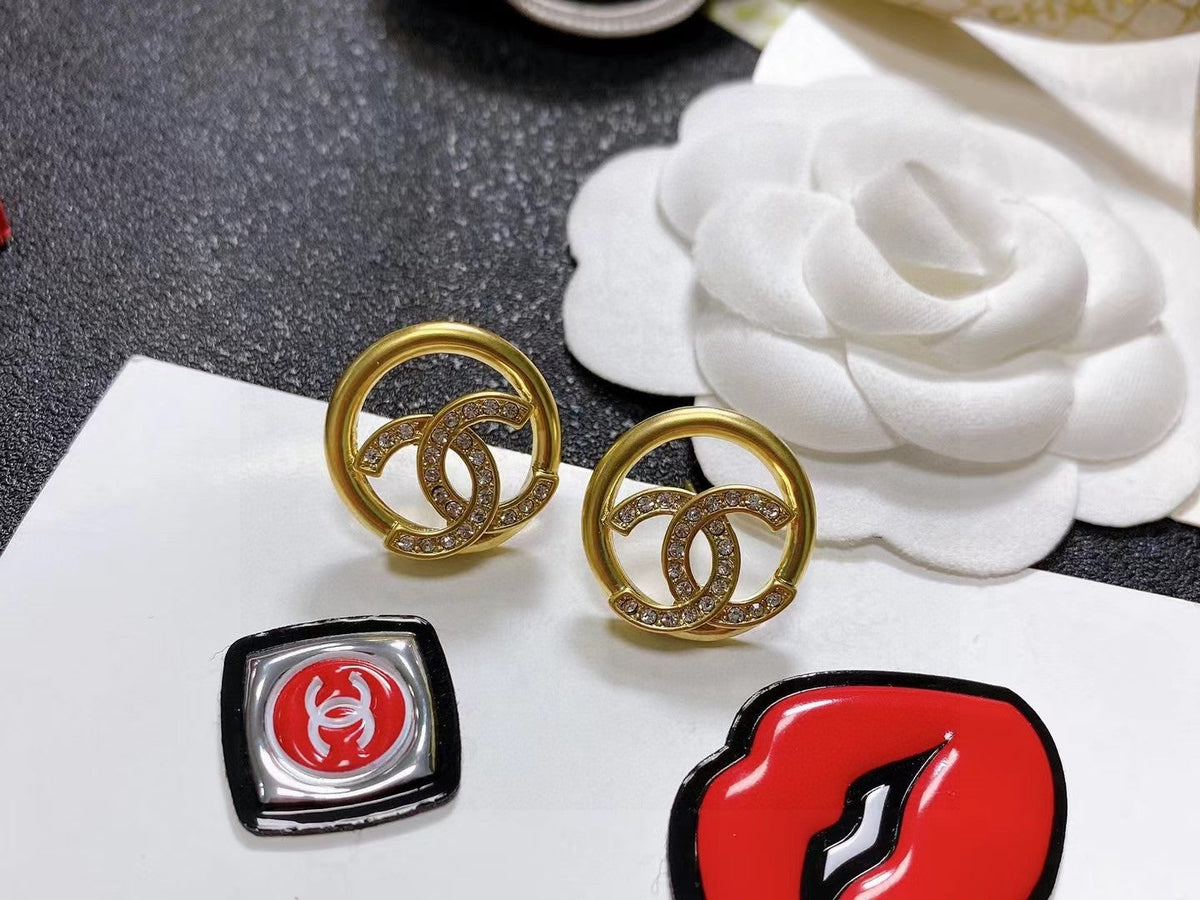 Martin Graham stud earrings in polished metal-tone – main product view