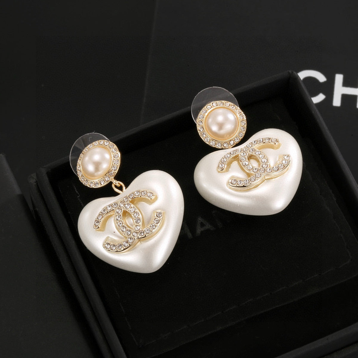 Martin Graham stud earrings in polished metal-tone – main product view