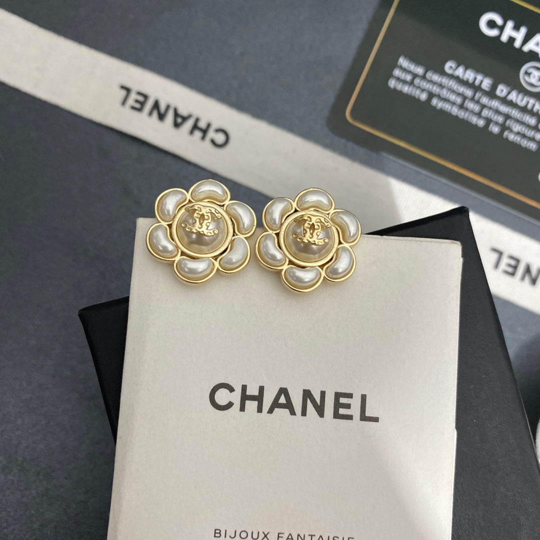 Martin Graham stud earrings in polished metal-tone – main product view