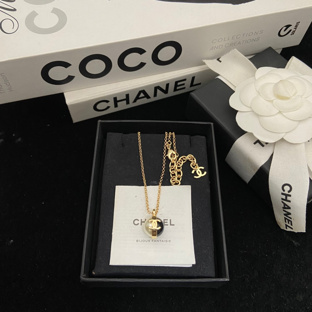 Martin Graham pendant necklace in polished metal-tone – main product view