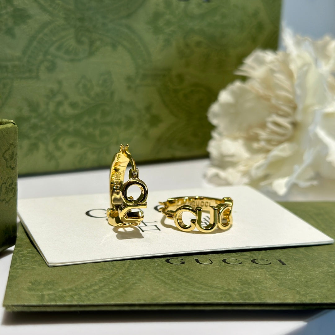 Martin Graham earrings in polished metal-tone – main product view