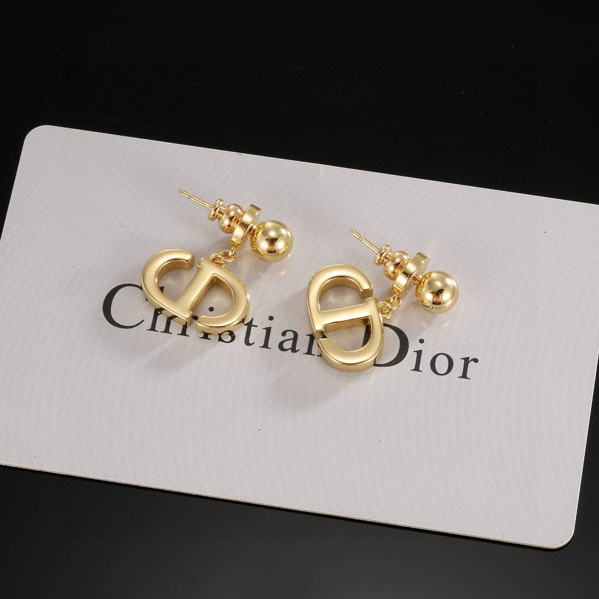 Martin Graham stud earrings in polished metal-tone – main product view